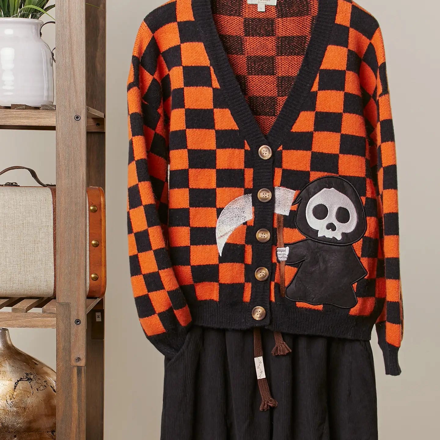 Checkerboard V-Neck Cardigan with Reaper Patch- COMNG SOON